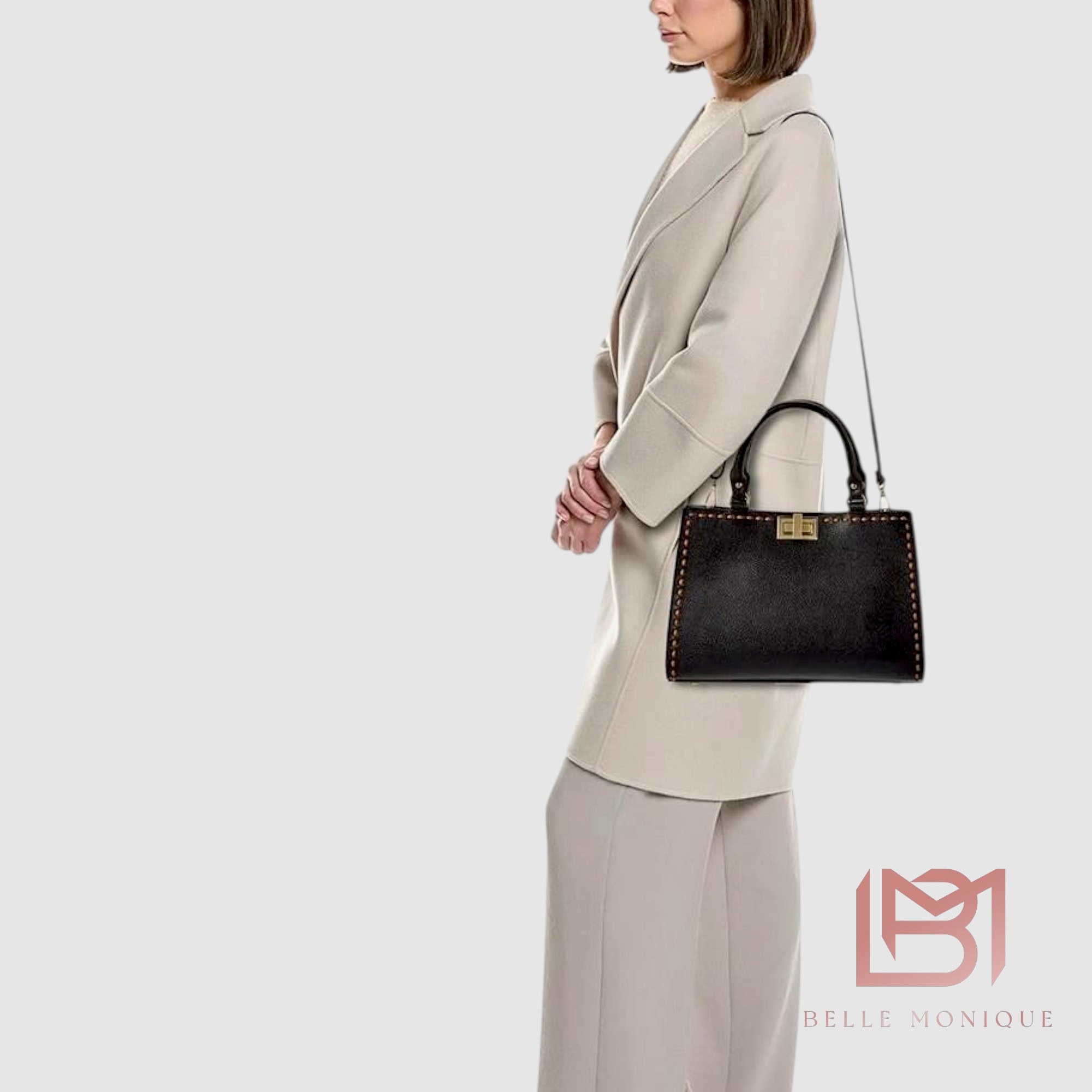 Geantă damă elegantă din piele naturală neagră, cu detalii couture și design italian sofisticat.