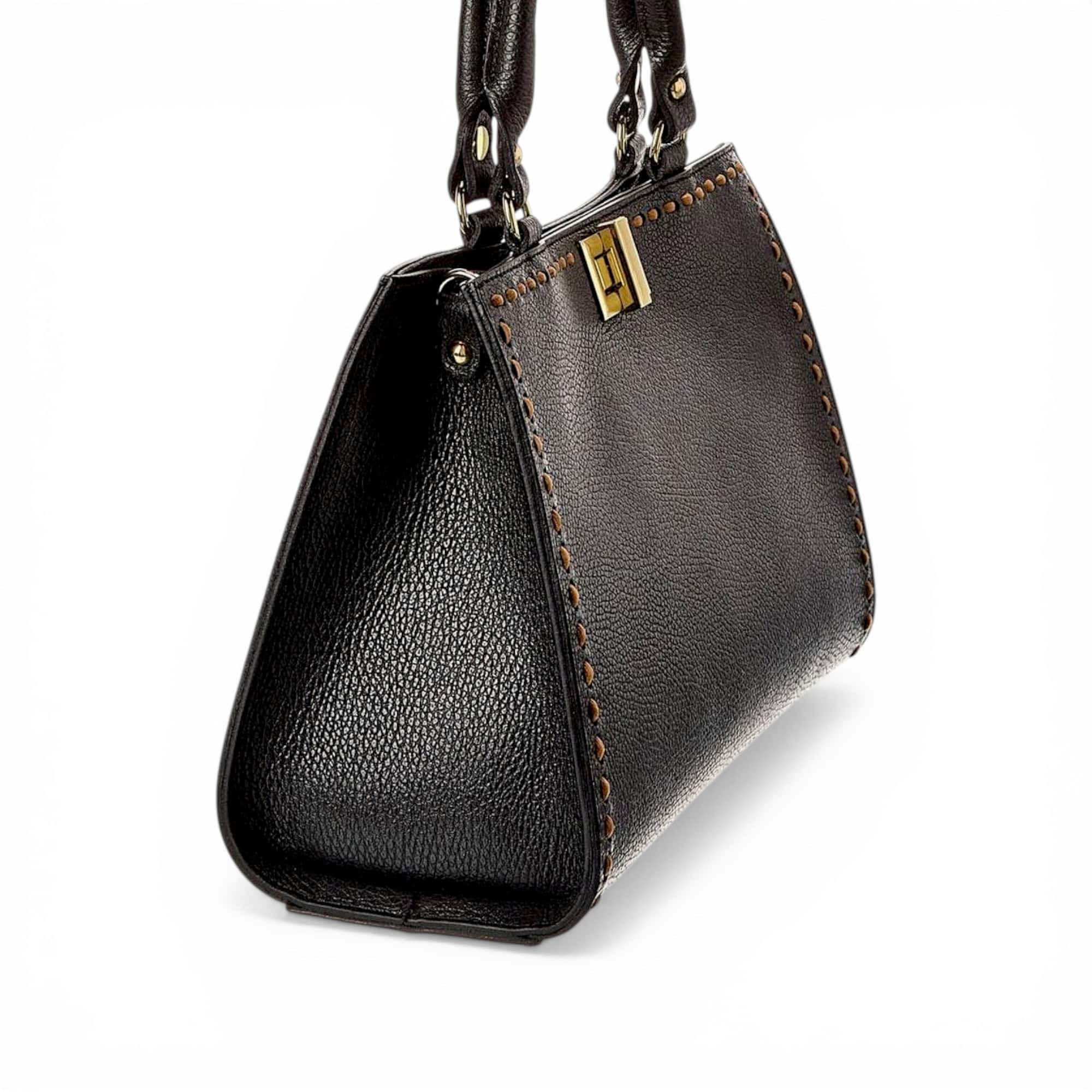 Geantă damă din piele naturală neagră, elegantă și sofisticată, cu detalii couture pentru un look ra.