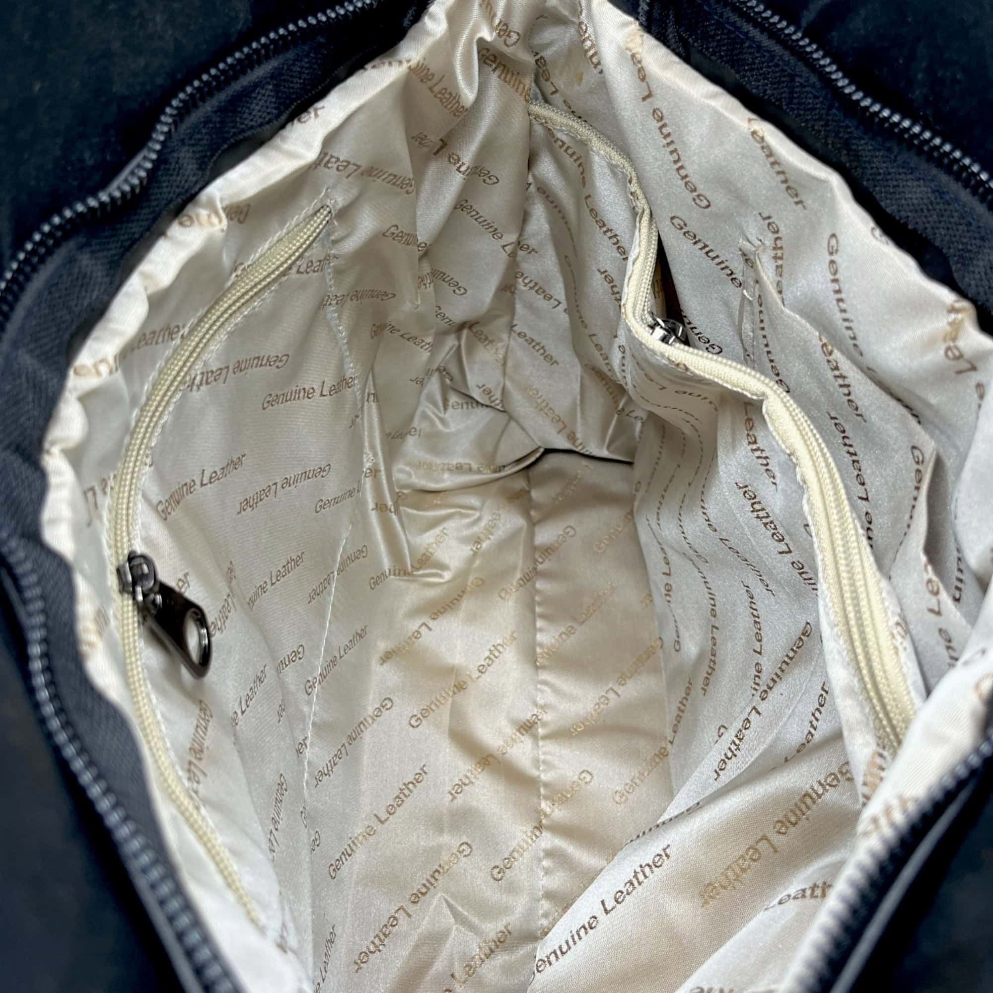 Gentiță damă din piele naturală, elegantă și versatilă, cu design modern, perfectă pentru orice ținu.