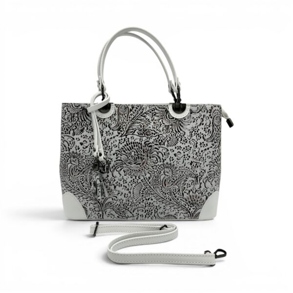 Geantă de damă cu model floral și mânere albe, perfectă pentru stil casual și elegant.