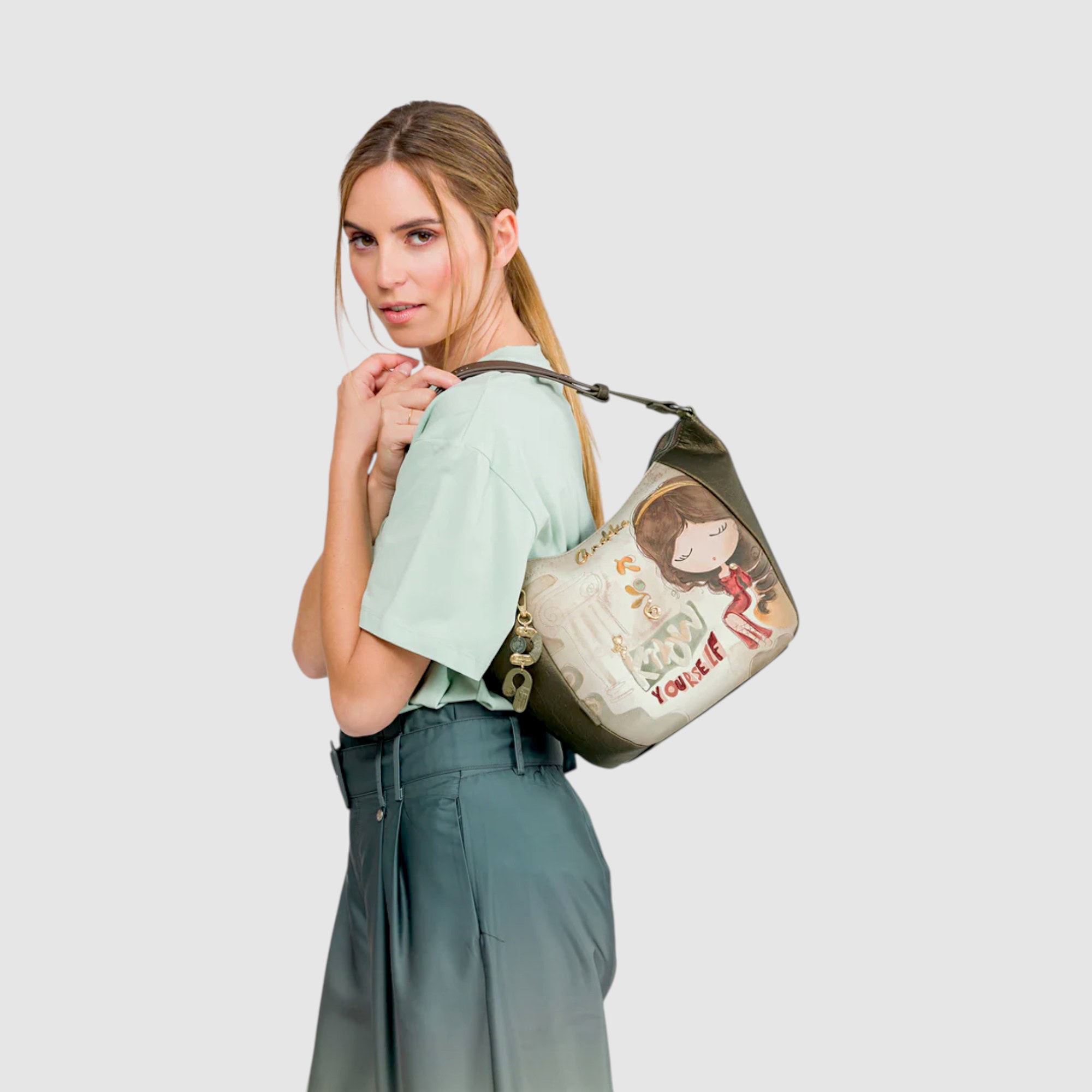 Geantă de umăr pentru femei, cu design artistic și detalii moderne, perfectă pentru stil casual și u.