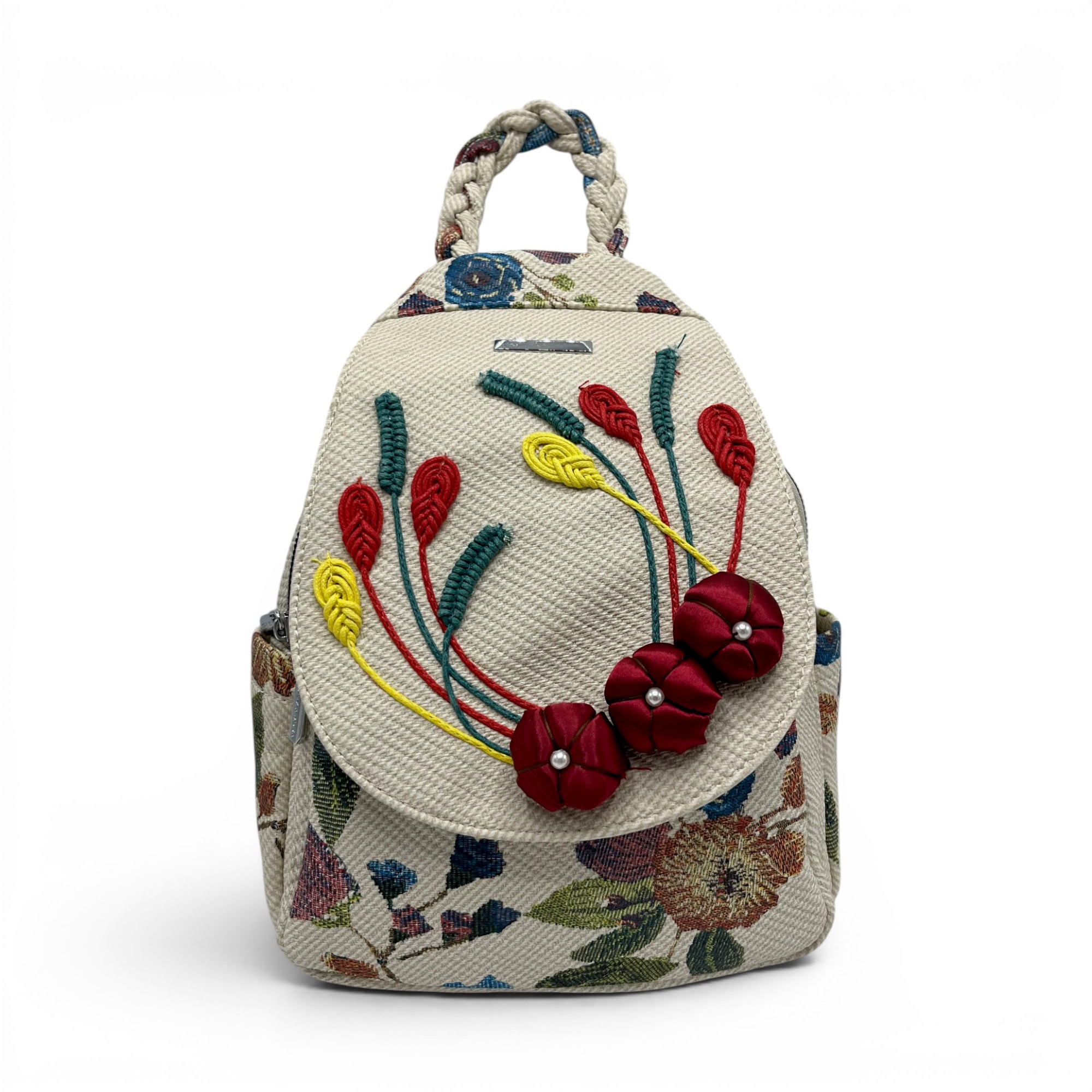 Rucsac damă floral și casual cu detalii colorate și design artistic.