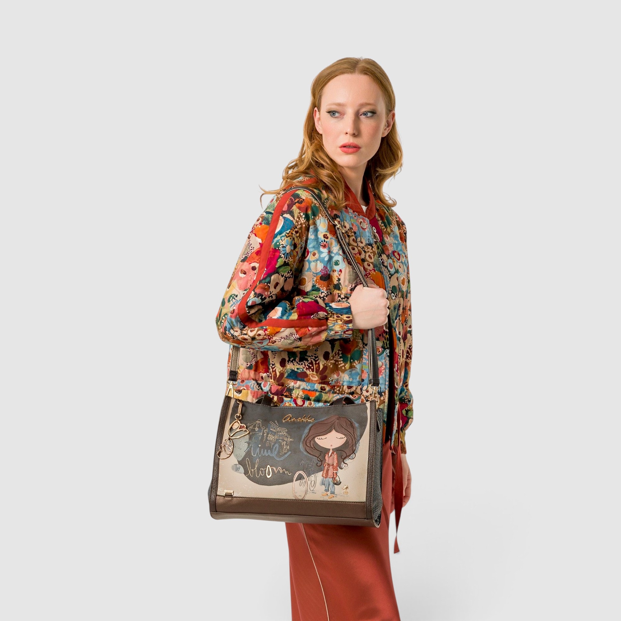 Geantă de umăr Anekke Tulip cu design floral și personaj.