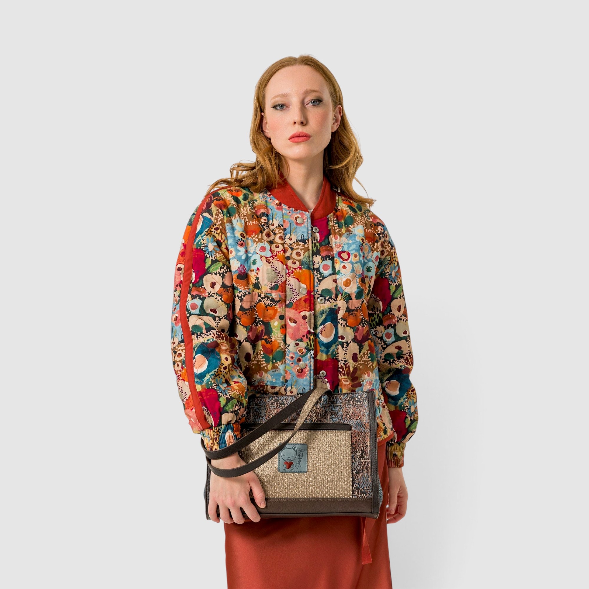 Geantă de umăr Anekke Tulip cu design colorat și detalii elegante.